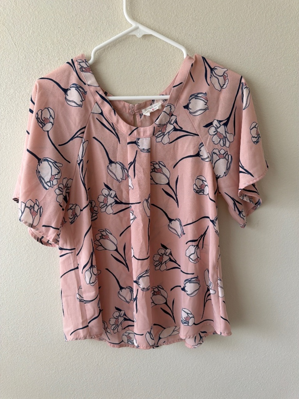 Pink blouse with cream tulips